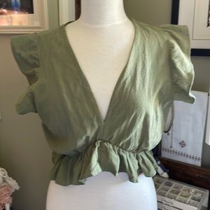 Green ruffled crop top
